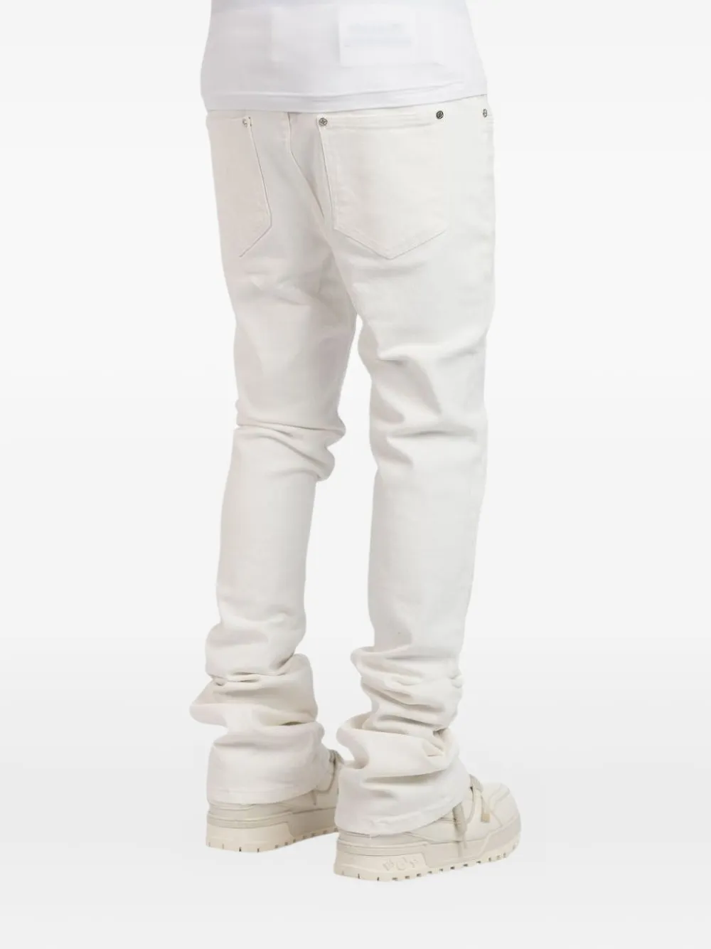 GUAPI stacked logo-embroidered jeans Wit