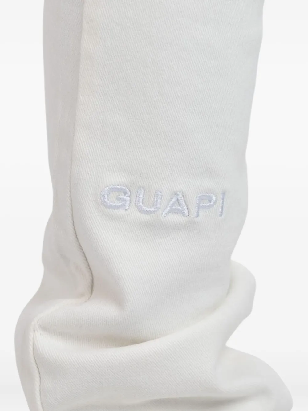 GUAPI stacked logo-embroidered jeans Wit