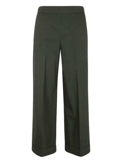 Kiltie pantalones plisados