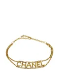 CHANEL Pre-Owned 1990-2000s logo-lettering chain belt - Gold