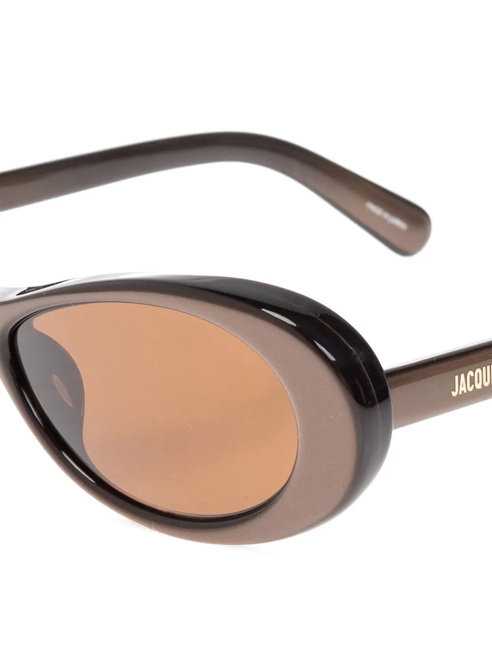 Jacquemus Zonnebril met ovalen montuur - Bruin