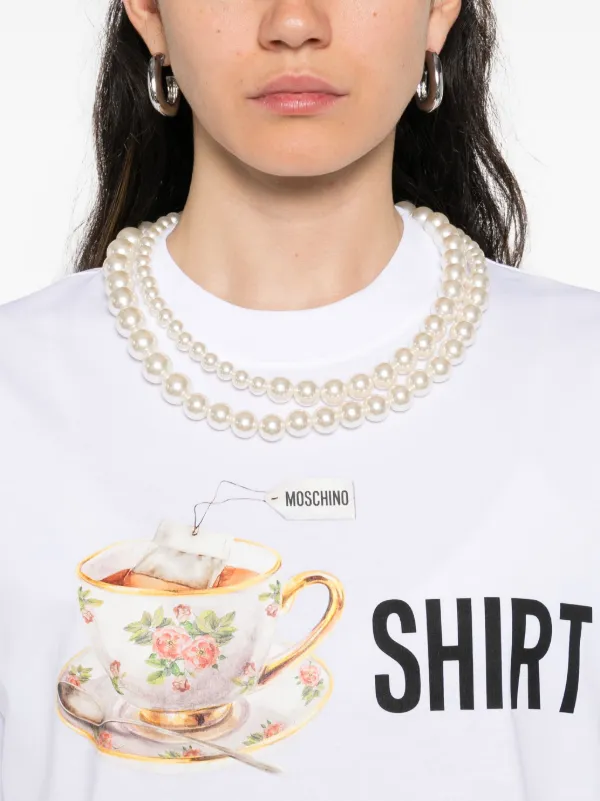 【関税込み】Moschino ホワイト ロゴグラフィック Tシャツ Moschino グラフィック Tシャツ | ホワイト | FARFETCH JP