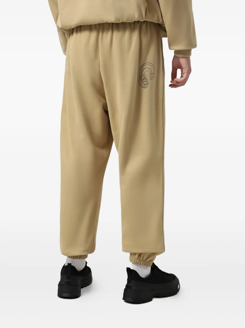 The North Face Mountain Cleanup trainingsbroek met grafische prints Beige