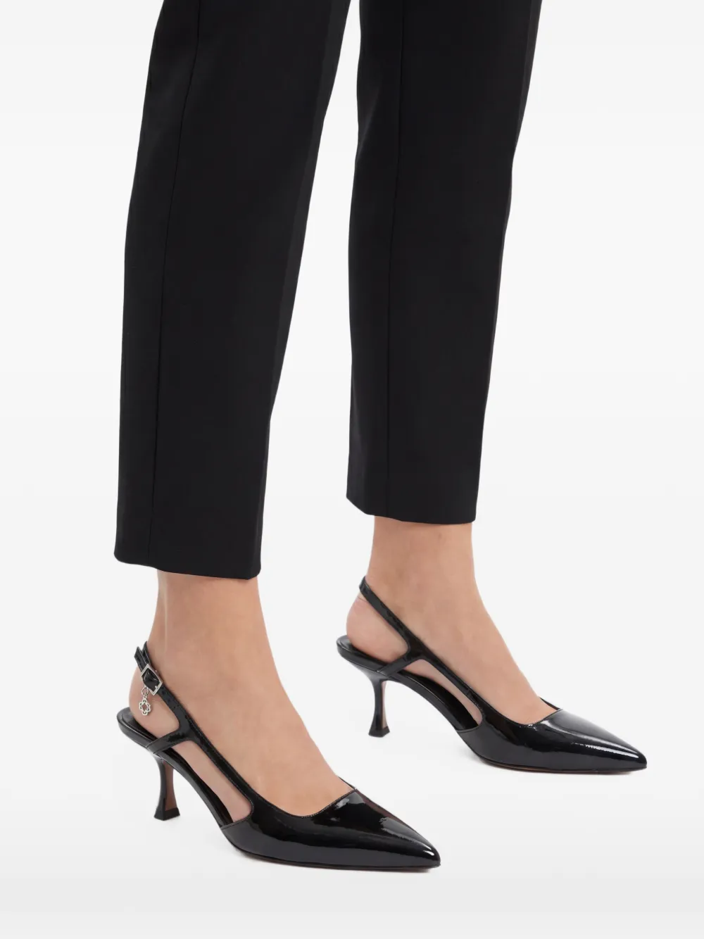 Maje Slingback pumps met puntige neus Zwart