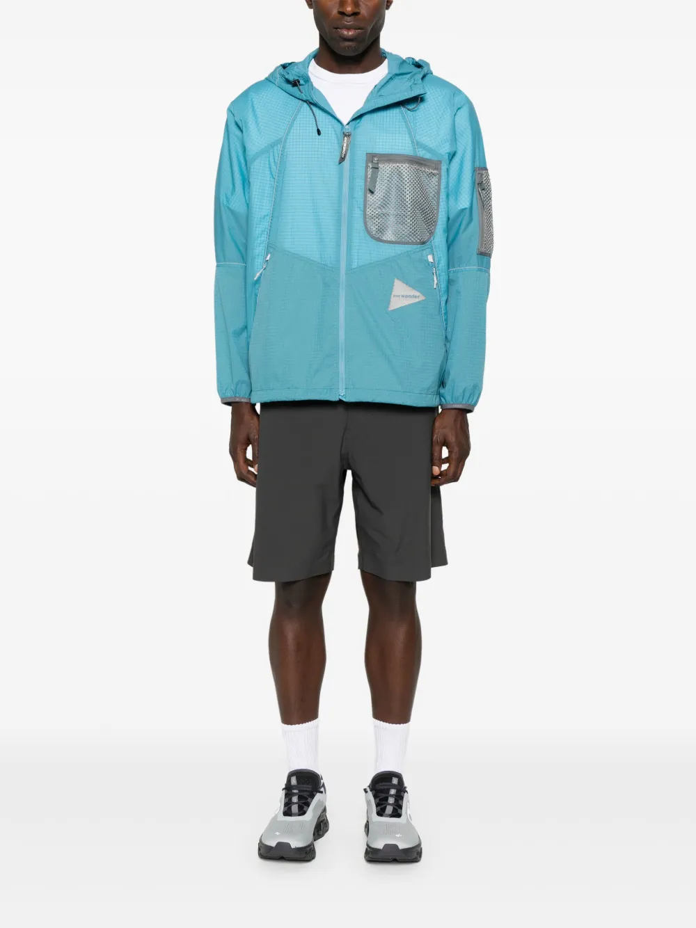 and Wander Breath Rip jack met capuchon en mesh zak Blauw