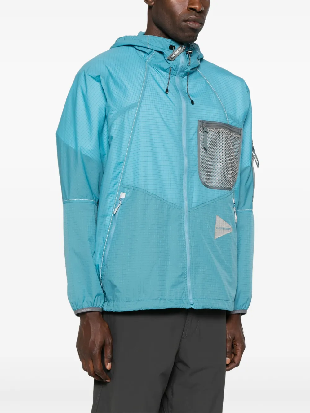and Wander Breath Rip jack met capuchon en mesh zak Blauw