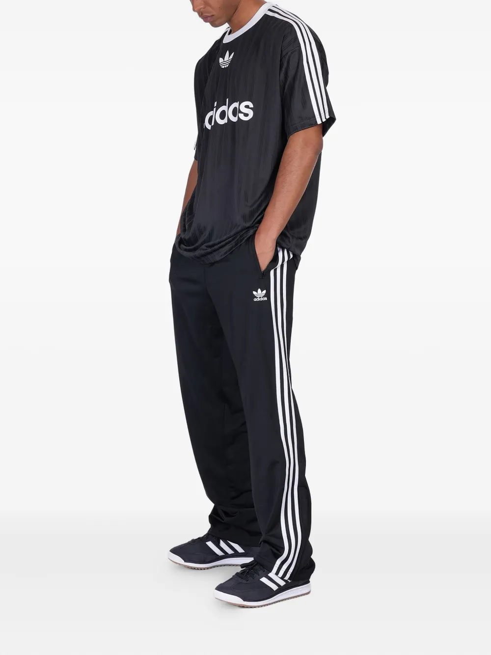 Adidas Gestreept T-shirt met logoprint - Zwart