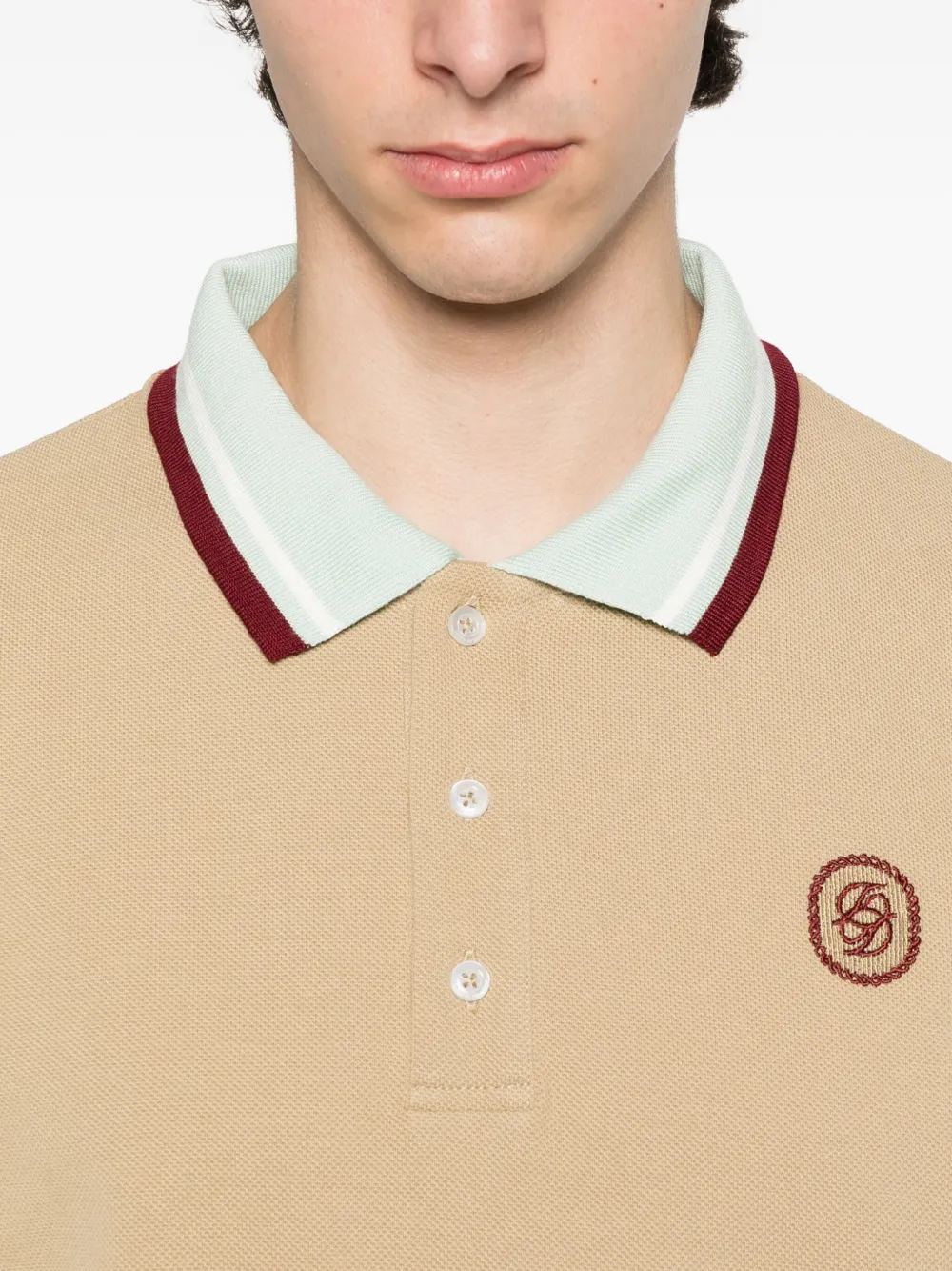Drôle De Monsieur Poloshirt met geborduurd logo Beige