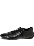 Louis Vuitton Pre-Owned monogram-embossed sneakers - Black