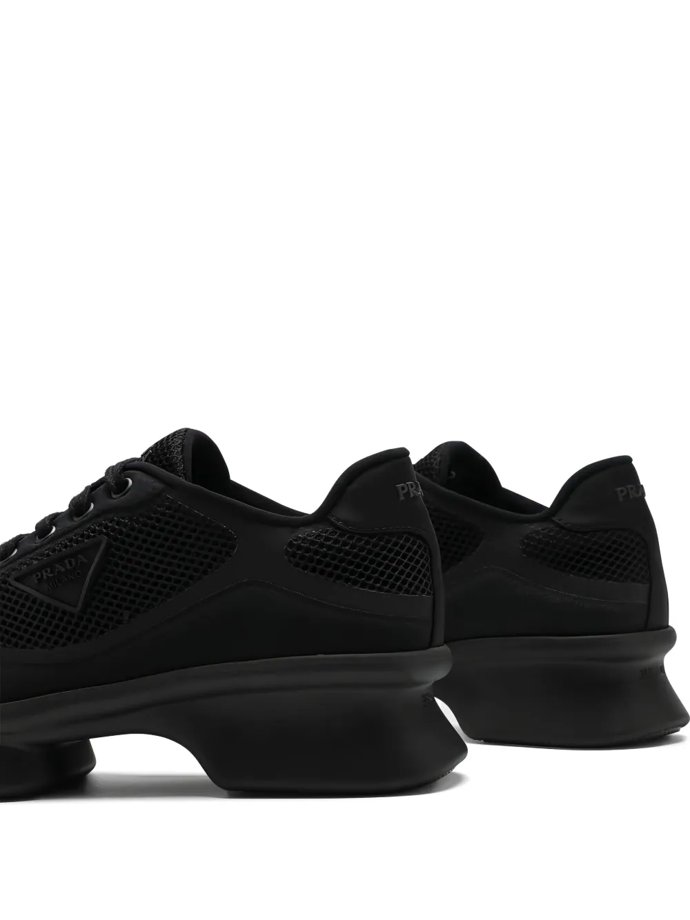 Prada Loafers met mesh vlakken en plateauzool Zwart