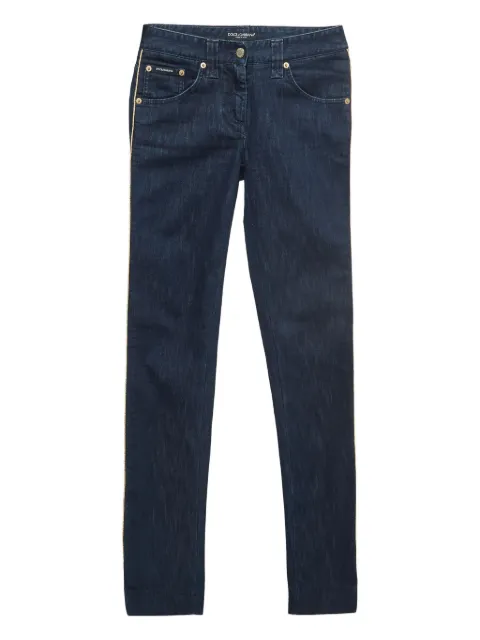 Dolce & Gabbana Pre-Owned jeans con rayas laterales 2024