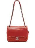 CHANEL Pre-Owned CC quilted shoulder bag - Orange