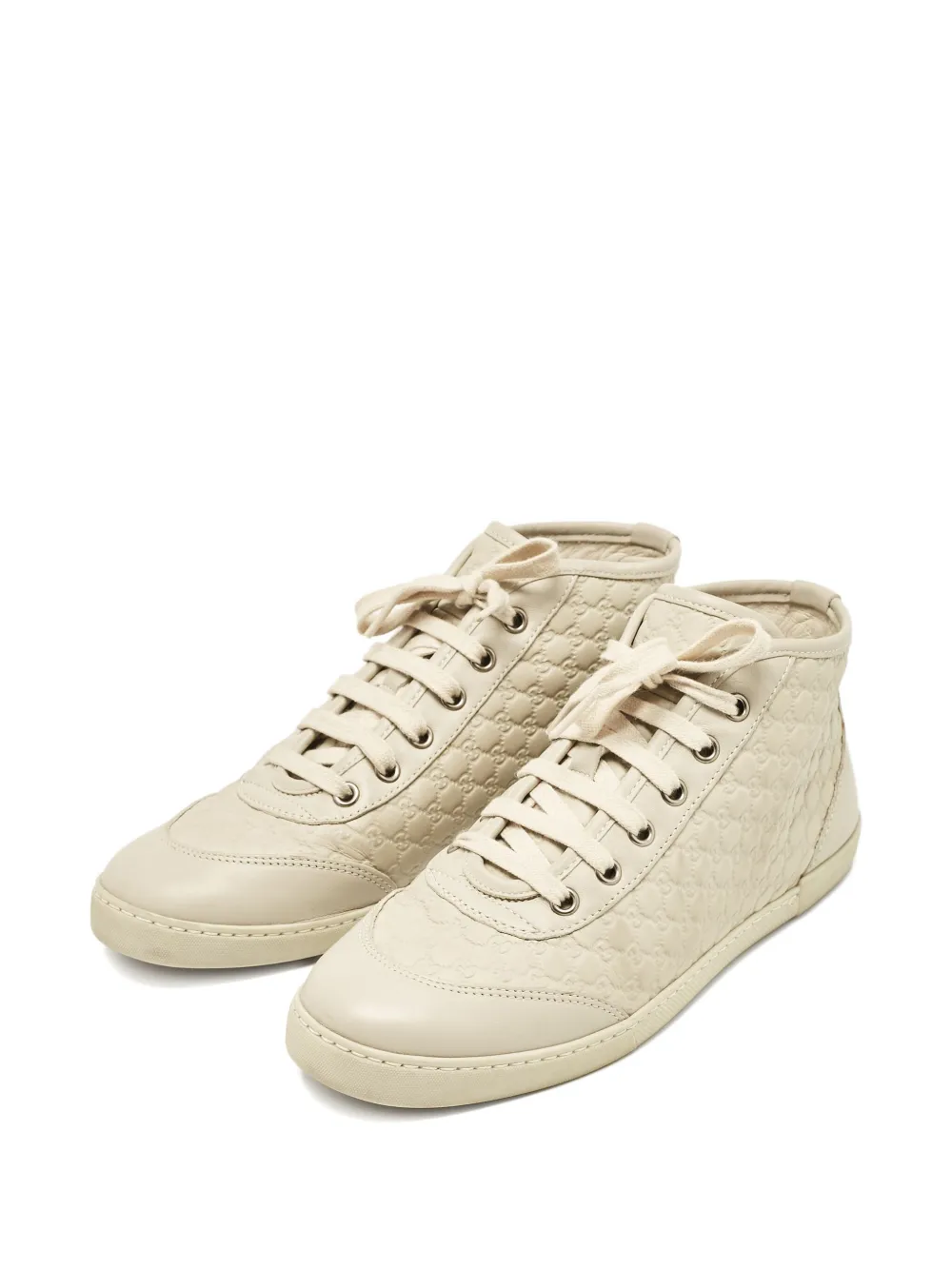 Gucci Pre-Owned Leren high-top sneakers met monogram-reliëf - Beige