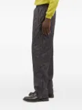 Metalwood Studio animal-print zip-cuff trousers - Black
