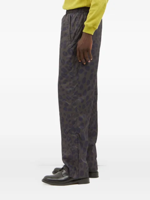 Metalwood Studio animal-print zip-cuff trousers