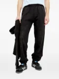 Nancy Ganz graphic-print fleece trousers - Black