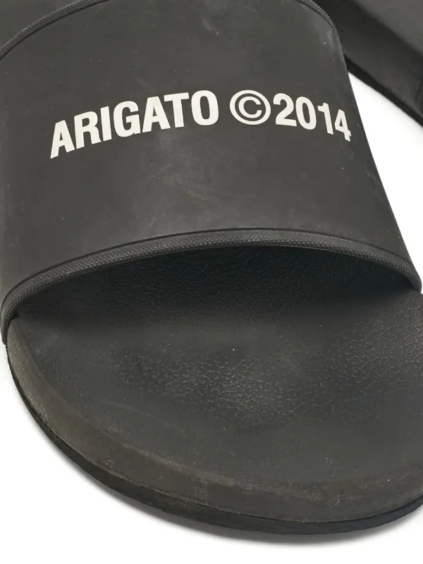 Axel Arigato pre-owned logo-print Slides | Black | FARFETCH