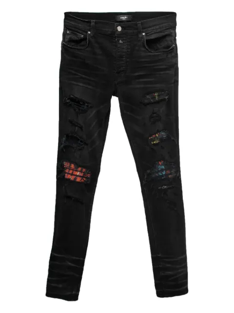 AMIRI distressed-effect patchwork-detail jeans