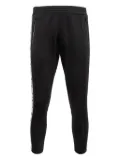 Moschino Pre-Owned logo-tape track pants - Black