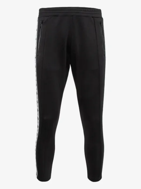 Moschino Pre-Owned pantalon de jogging à bandes logo
