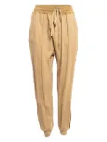 Haider Ackermann satin-stripe cotton track pants - Brown
