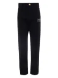 Balmain Kids logo-patch trousers - Black