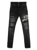 AMIRI distressed-effect skinny jeans - Black