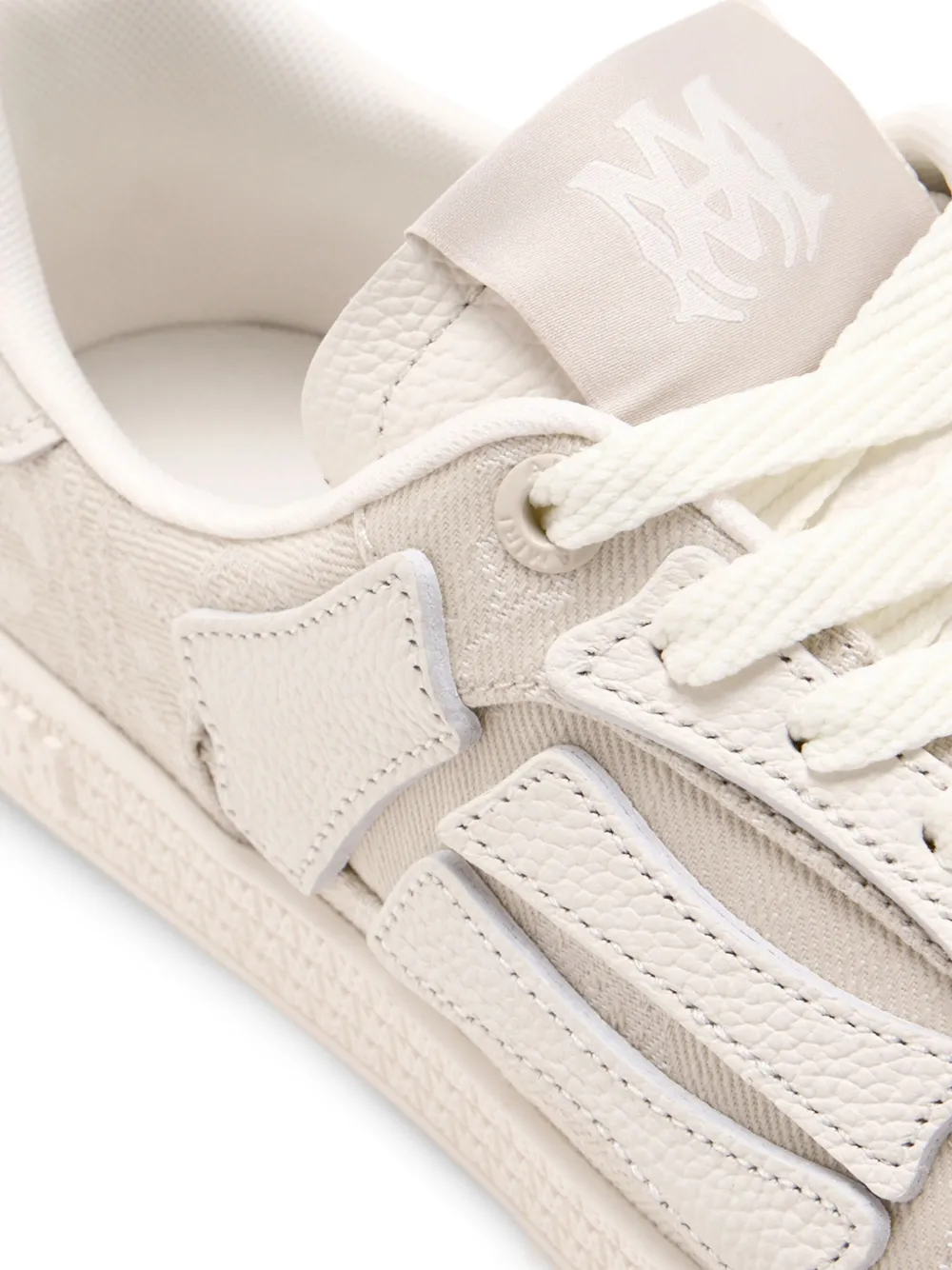AMIRI Canvas sneakers met skeletdetail Beige