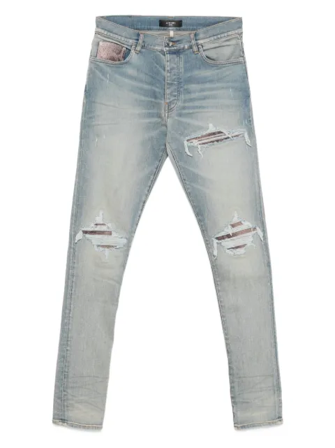 AMIRI leather-trimmed jeans