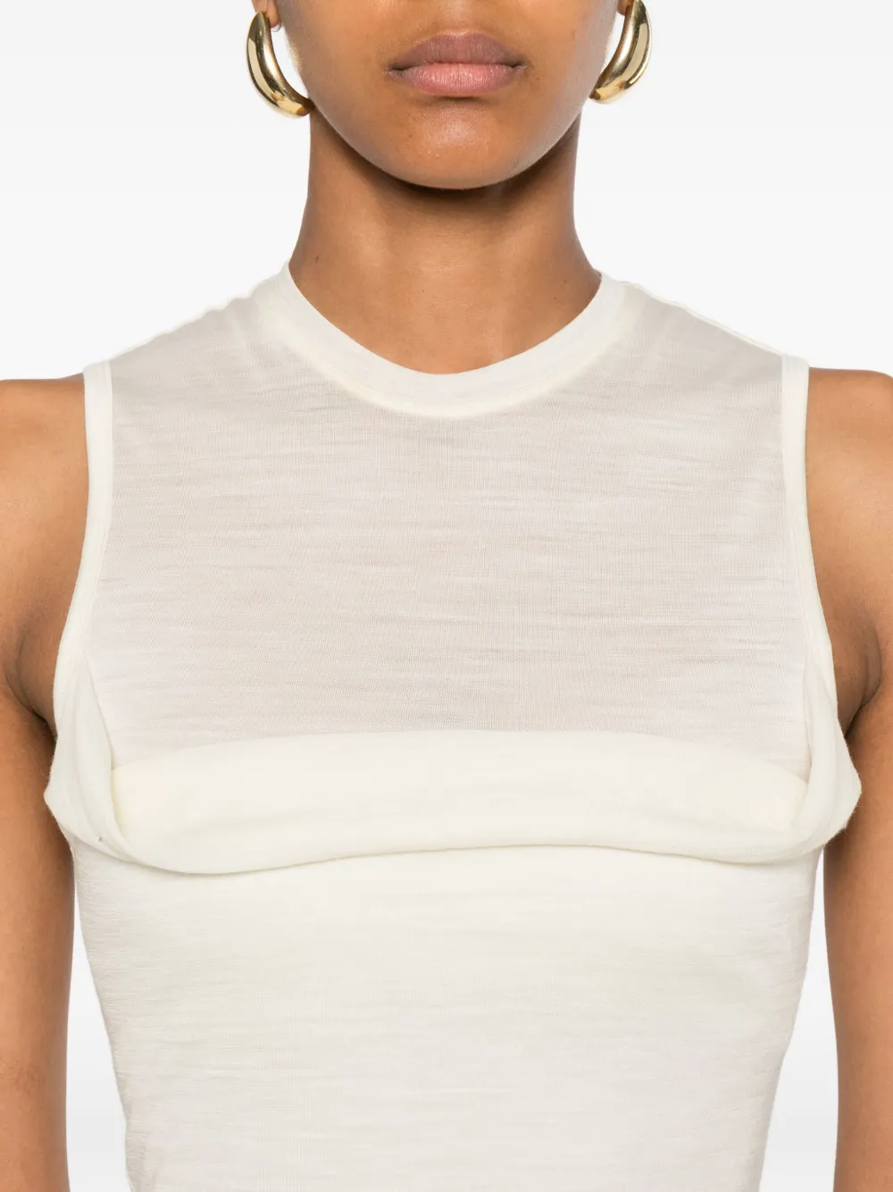 Nanushka Mouwloze top Beige