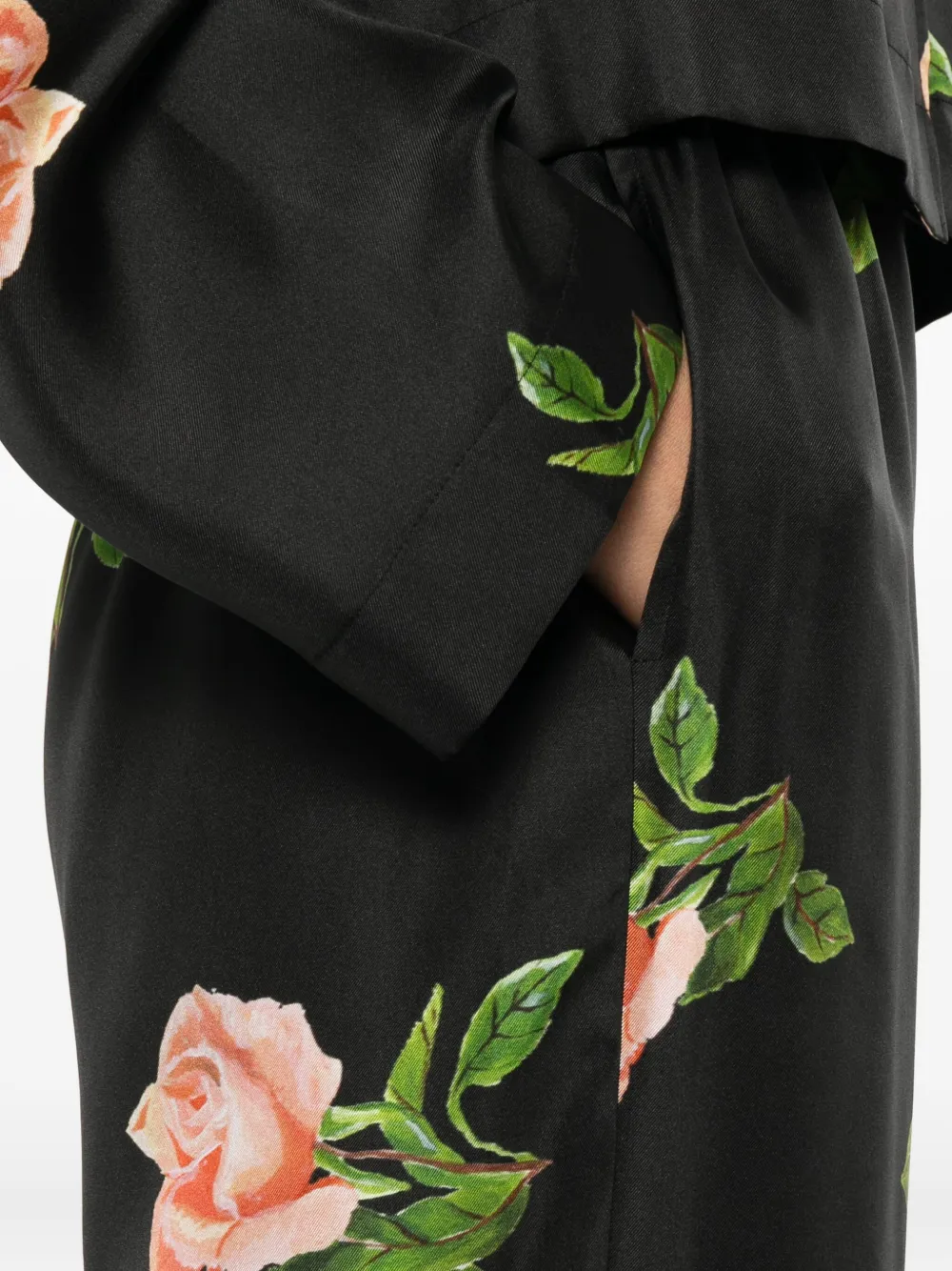 Nanushka Arven broek met elastische taille en roosprint Zwart