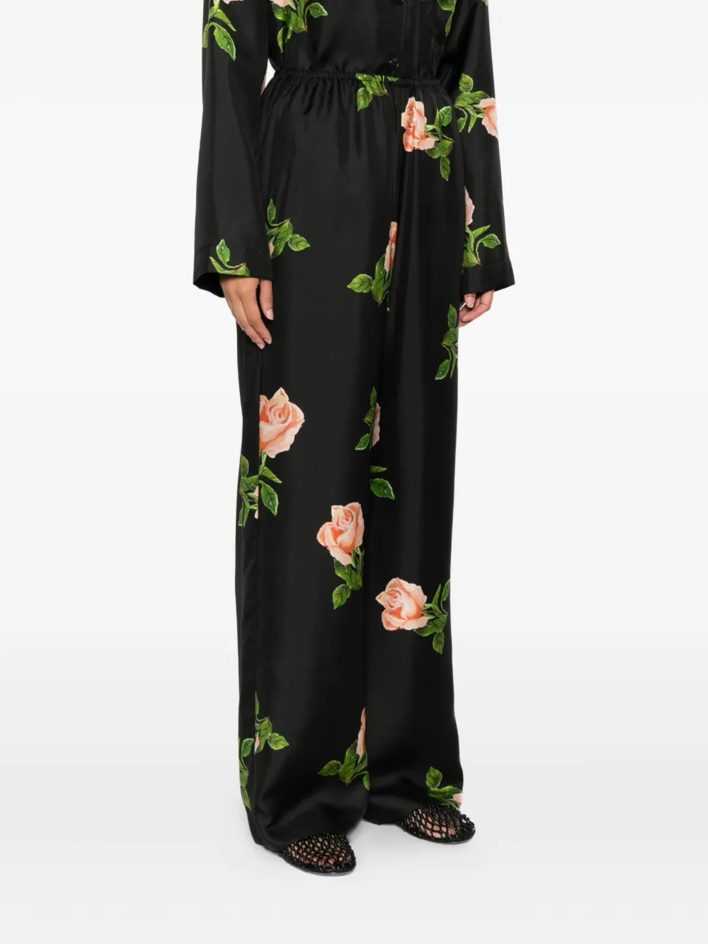 Nanushka Arven broek met elastische taille en roosprint Zwart