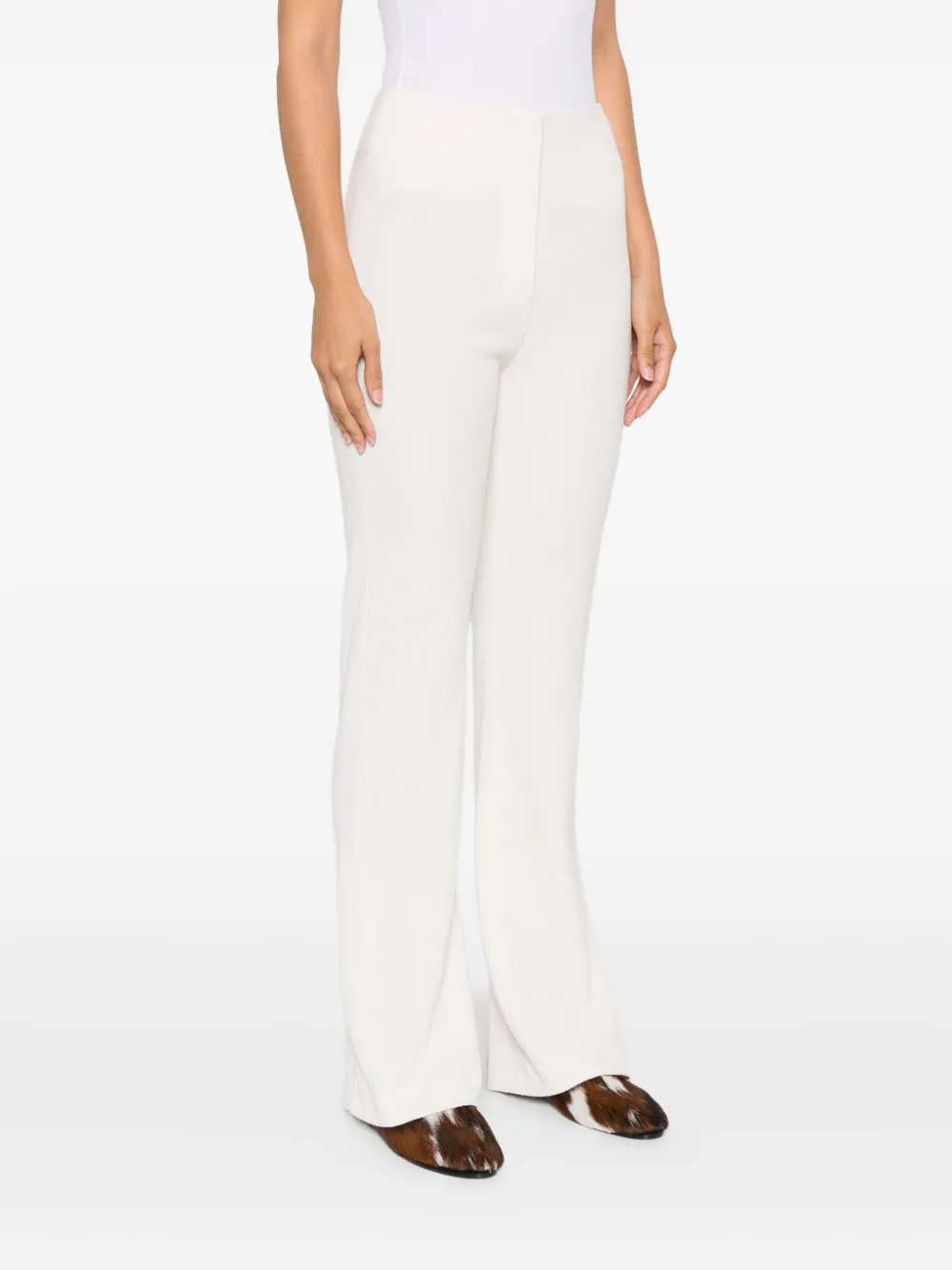 Nanushka Shera broek met split aan de achterkant Beige