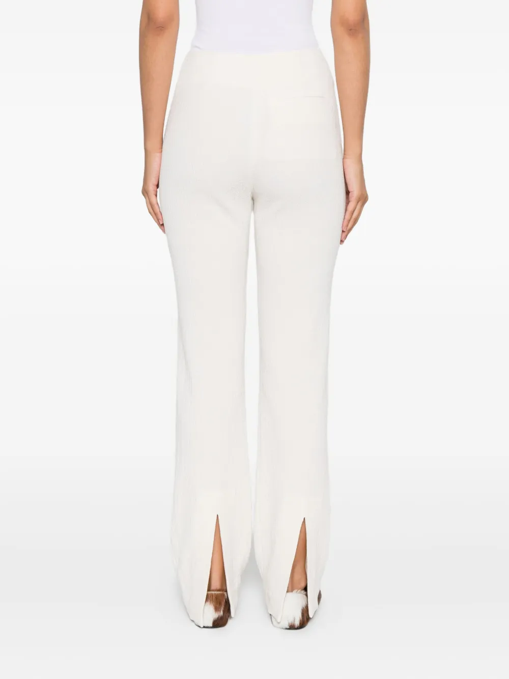 Nanushka Shera broek met split aan de achterkant Beige