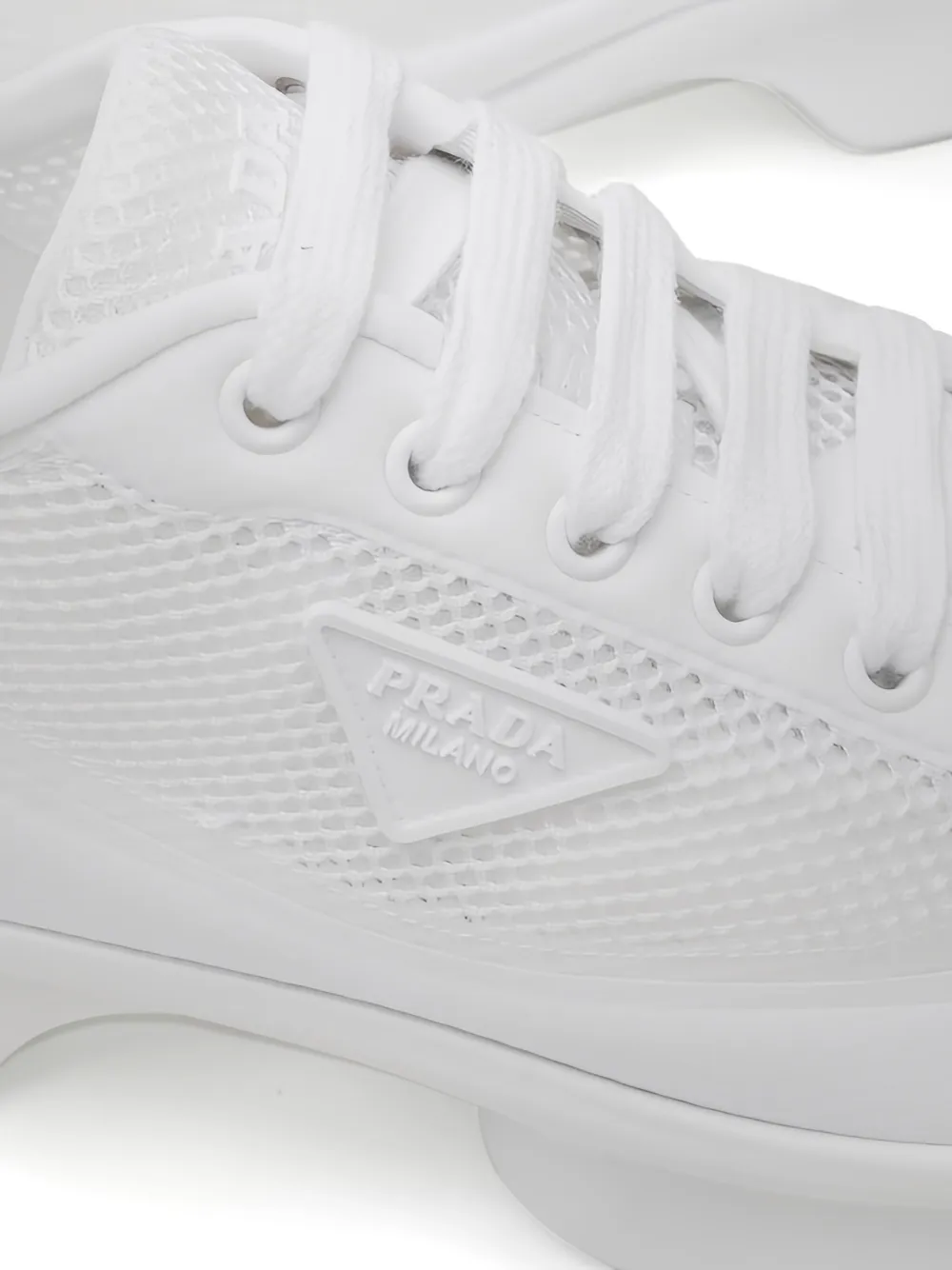 Prada Sneakers met plateauzool en mesh vlakken Wit