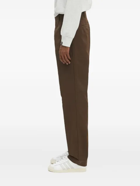 Carhartt WIP flat-front logo-patch trousers