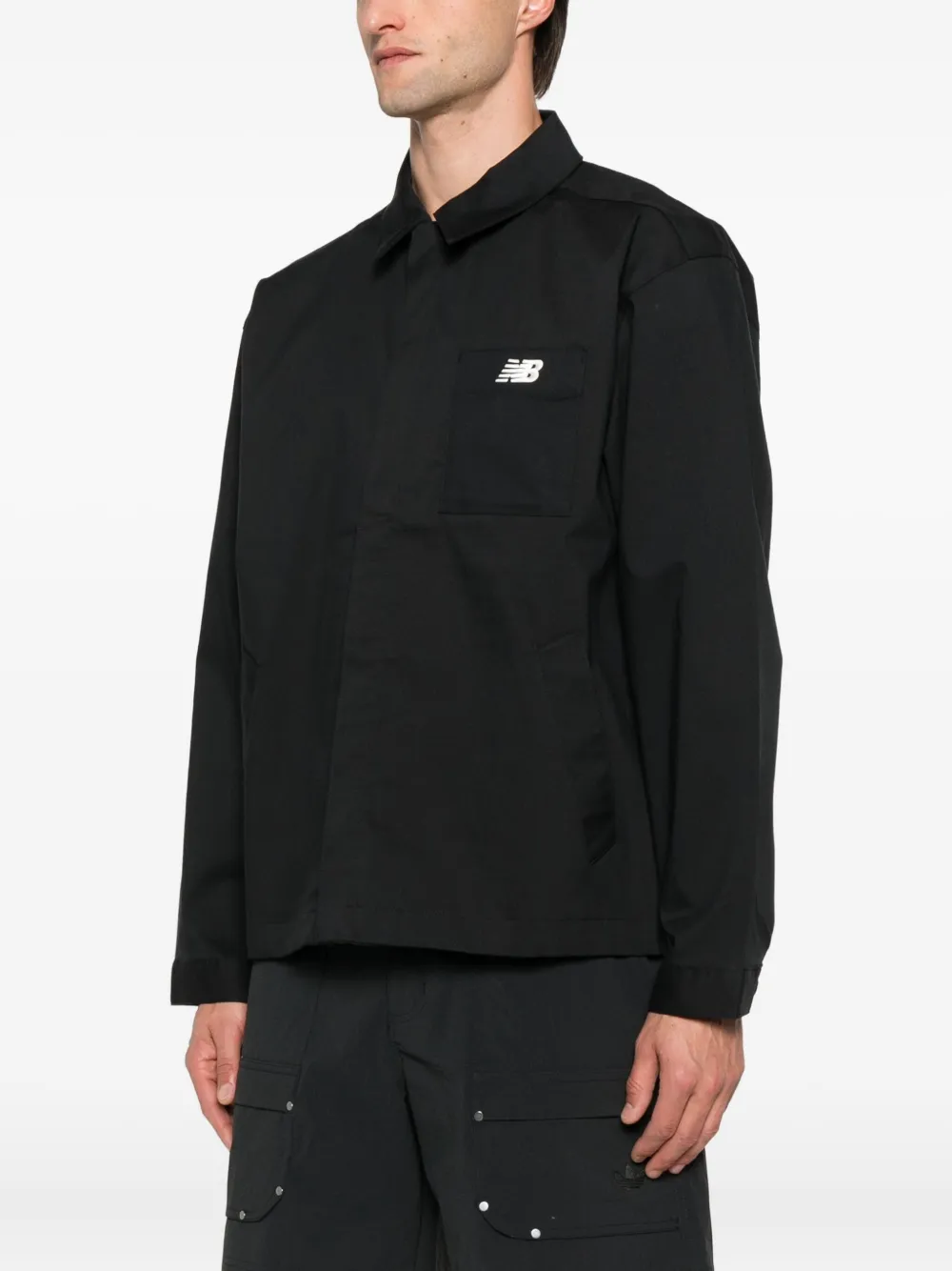 New Balance Shirtjack met geborduurd logo Zwart
