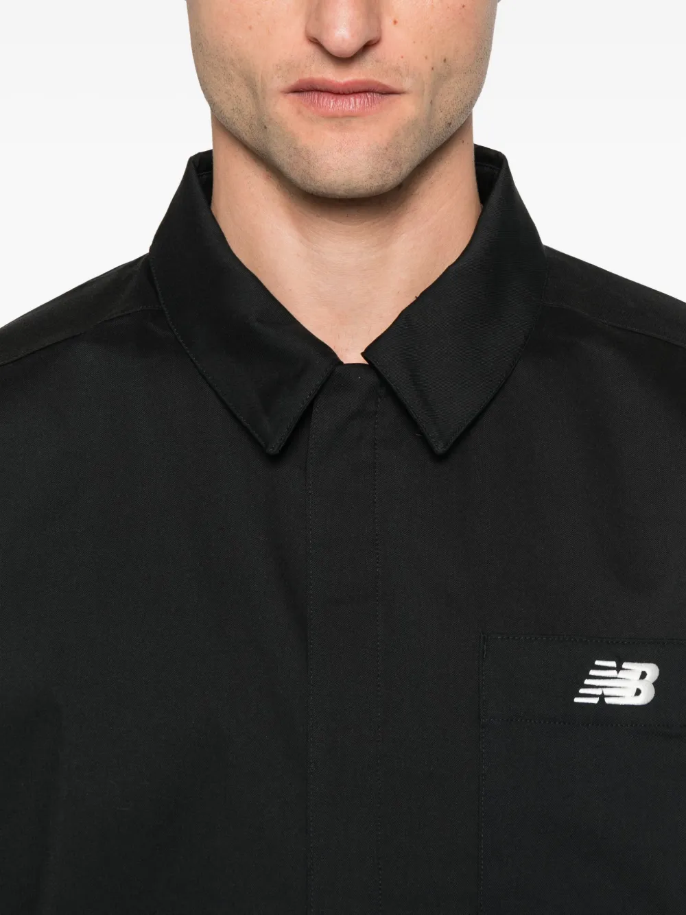 New Balance Shirtjack met geborduurd logo Zwart
