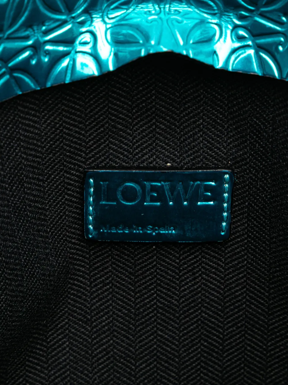 Pre-owned Loewe 2015 Embossed Metallic Patent Anagram Repeat T Pouch Clutch Bag
