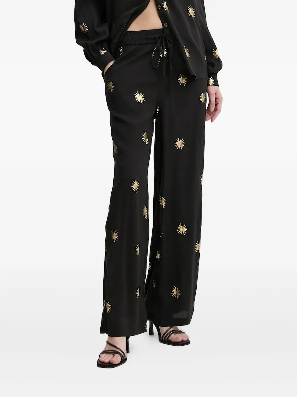 NEVER FULLY DRESSED Broek met zonprint Zwart