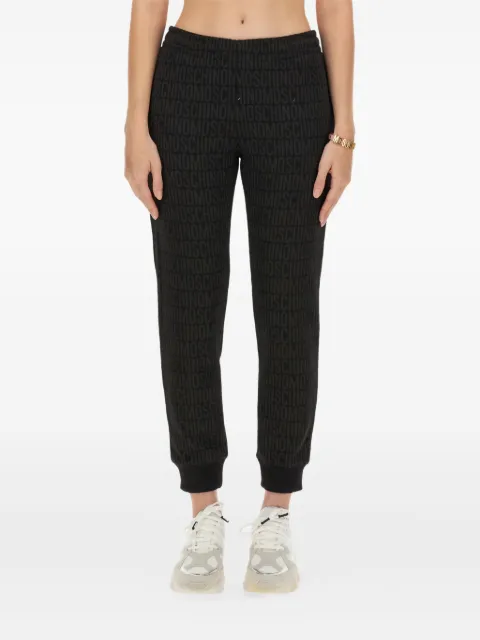 Moschino monogram-print track pants