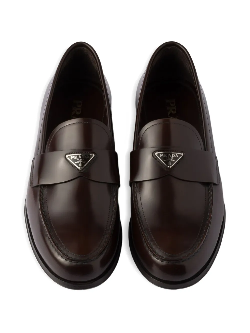 Prada Leren loafers met logo Bruin