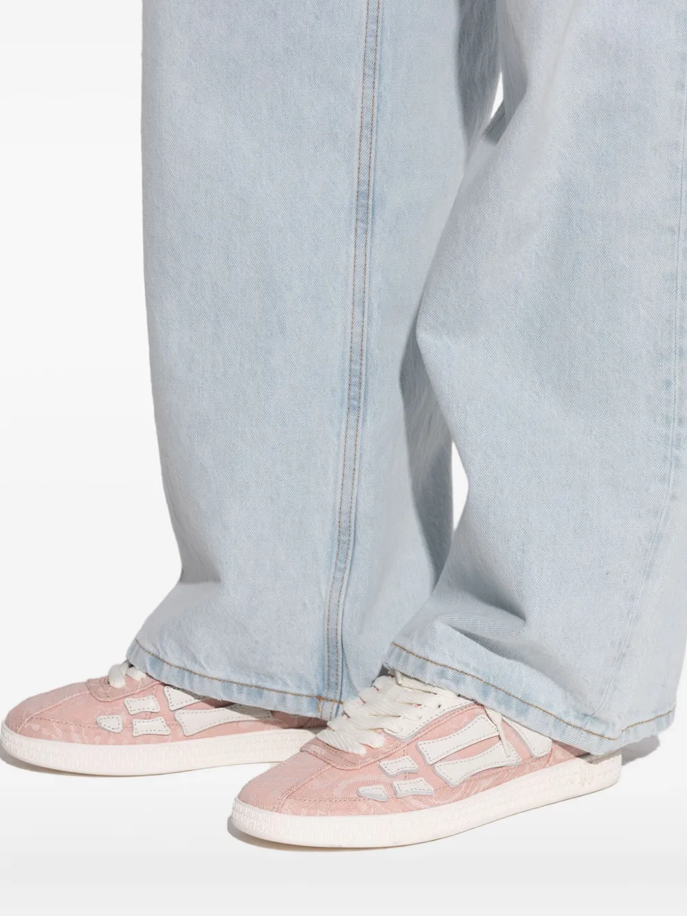 AMIRI monogram-embossed lace-up sneakers Pink