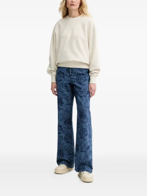 A.P.C. jeans con estampado floral