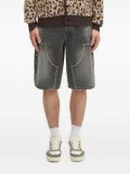 A BATHING APE® studded denim shorts - Black