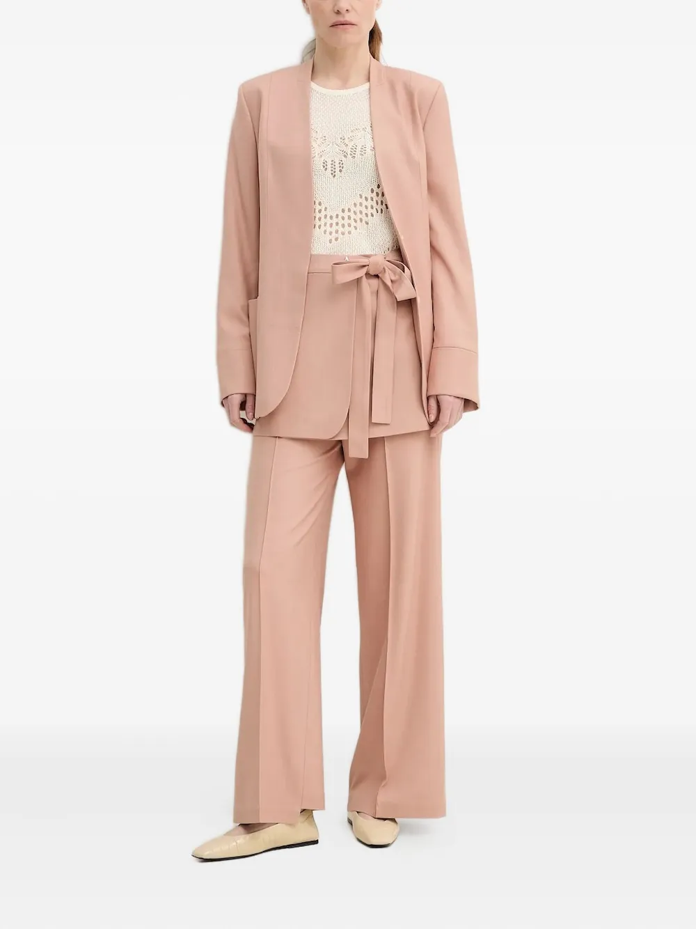 AERON wrap-front split-hem trousers Roze