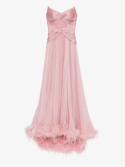 Iris Serban robe longue Mikael bordée de plumes