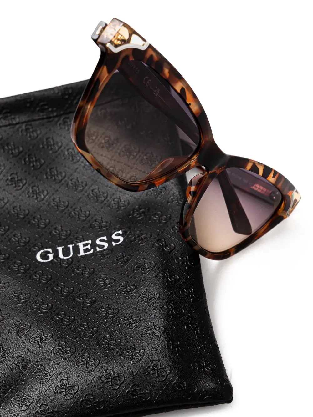 GUESS EYEWEAR Zonnebril met cat-eye montuur en schildpadschild design Bruin