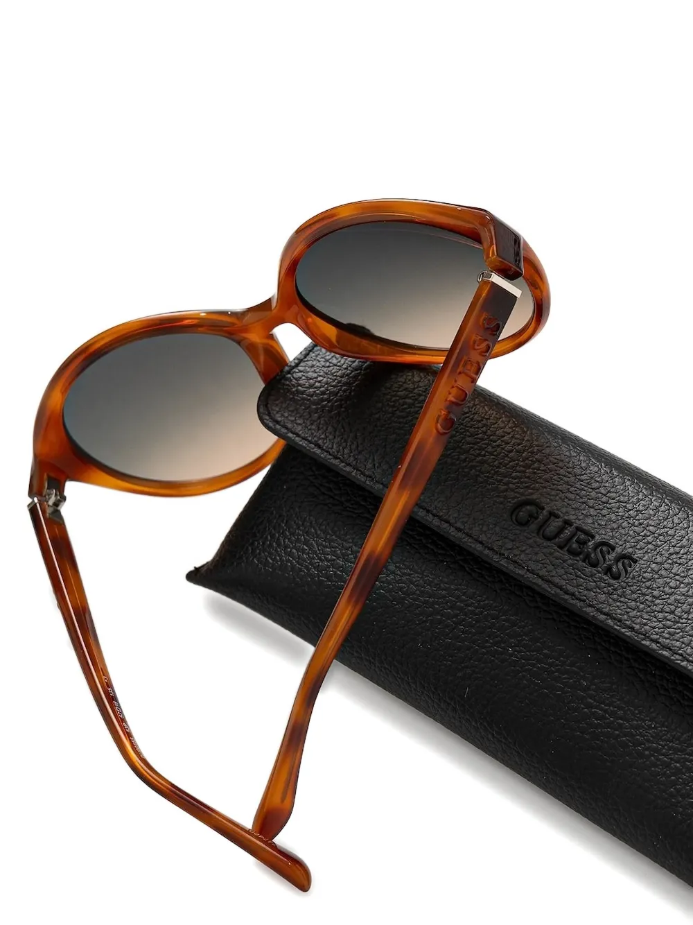 GUESS EYEWEAR Zonnebril met rond montuur en schildpadschild-design Bruin