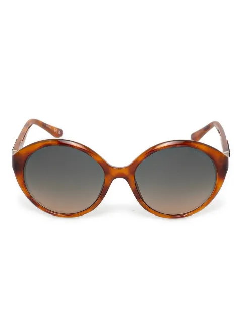 GUESS EYEWEAR lentes de sol con armazón redonda estilo carey